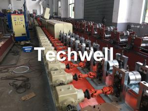 China Aluminum , Carbon Steel Pu Foam Rolling Shutter Door Making Machine With Servo Tracking Flying-Saw Cutting on sale