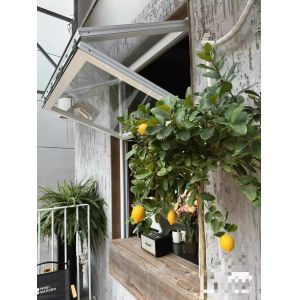 View Stained Glass Inspired Folding Window Creating Kaleidoscopic Light Patterns