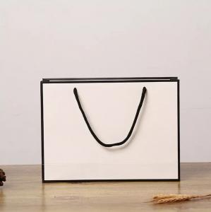China Recyclable Kraft Paper Handbag Cardboard Rope Handle Gift Bag ISO on sale