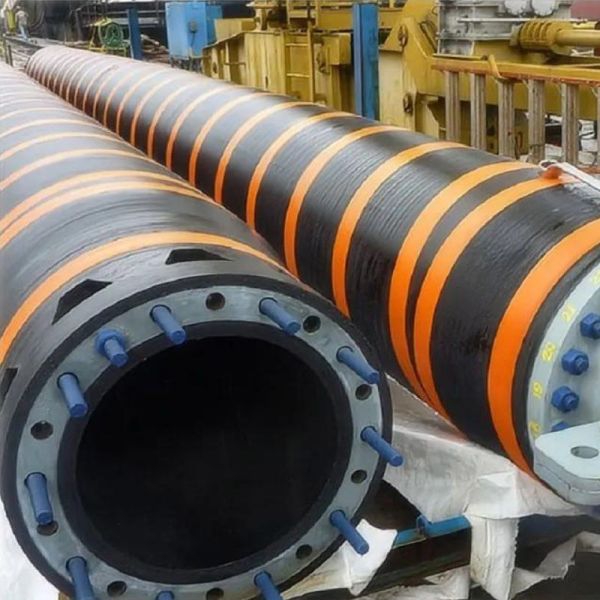 Floating dredge hose in operation on water surface