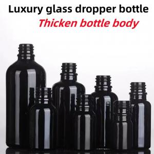 Wholesale Black 10, Ml 15ml 20ml 30ml 50ml empty round black shiny Glass Essential Oil Dropper Bottle with Plastic Gold ring from china suppliers