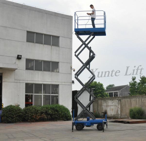 Quality Hydraulic Mobile Scissor Lift 6 Meters Platform Height 1 Ton Loading Capacity For Exhibition Hall for sale