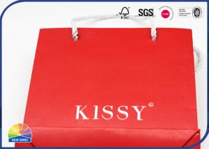 China Recycled Luxury Handle Glossy Kraft Paper Gift Bag With Custom Logo on sale