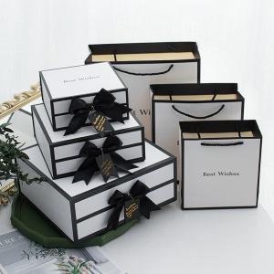 Wholesale Christmas Box Paper Boxes And Paper Bags Large Custom Logo Bag Paper Packaging With Bow from china suppliers