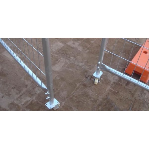 The opening temporary fence gate is installed two white rubber wheels.