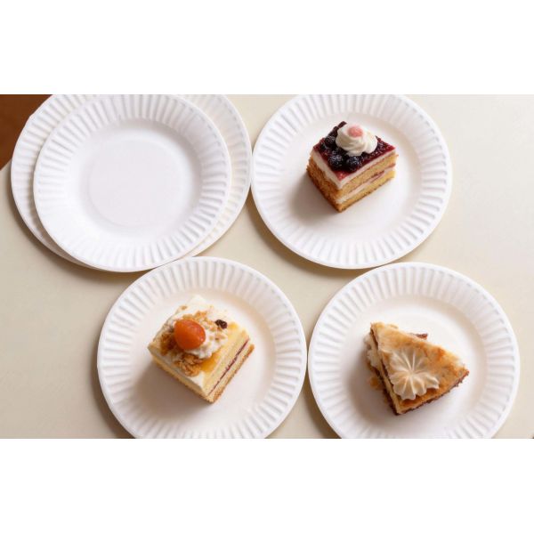 Sturdy disposable 9-inch paper plates designed to withstand heavy in catering kitchens banquet halls and food service operations